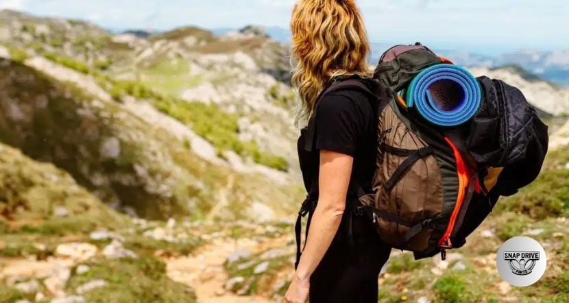 how to attach sleeping pad to backpack