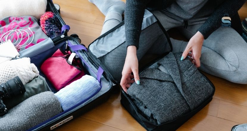 how to pack a suit in a suitcase